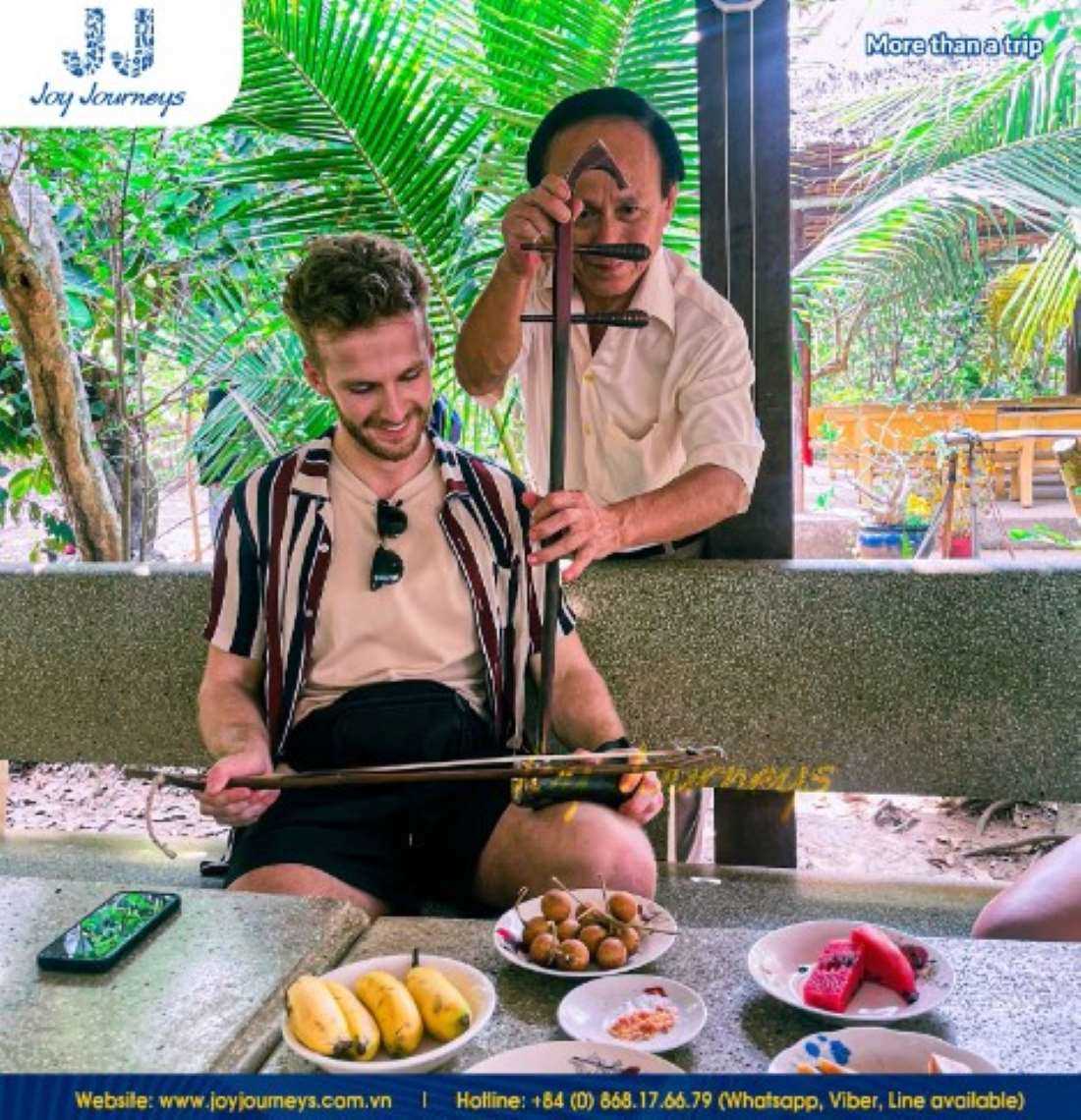 Tourists love to enjoy traditional music during their Mekong Delta tour