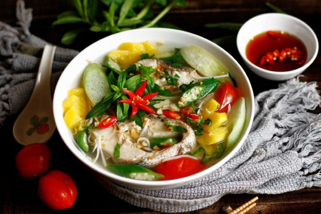 Savor the perfect balance of sweet and sour in sour fish soup, crafted with fresh fish and local veggies